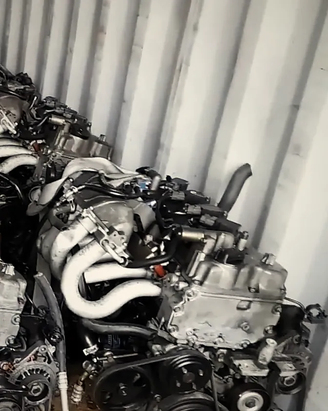 Engines packed tight against the wall of an export container